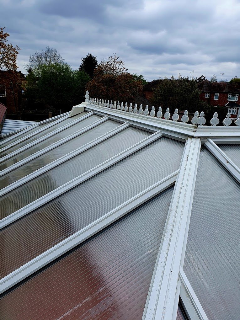 Victorian conservatory roof with cresting after a clean.